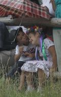 Children under umbrella
