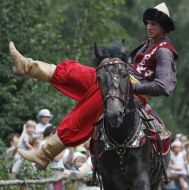 Horsemen in a costume of Crimean Tatar