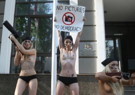 Action of FEMEN in support of arrested Georgian photographers