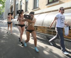 Action of FEMEN in support of arrested Georgian photographers
