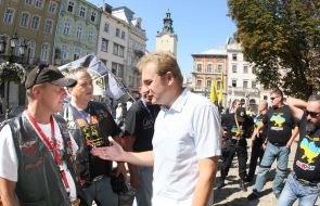 Andrey Sadovyi and participants of a motocross BayKray 