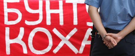 A militiaman near a banner
