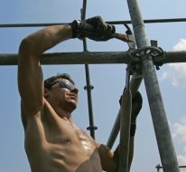 Worker assembles a tribune
