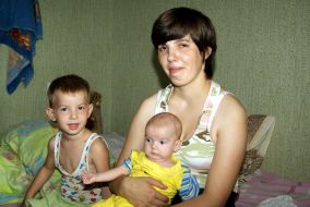 Mother with children in the hostel 