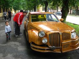 Passers-by examine an unique car