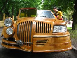 Passers-by examine a unique car