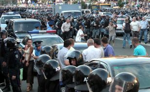 Soldiers of "Berkut" convoy a paddy wagon with Timoshenko