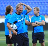 Eric Hamre and players of the national team of Sweden