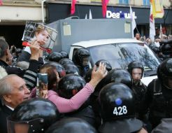 A paddy wagon with Timoshenko convoyed by "Berkut"