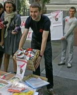 Participant of protest action against rising of price of condoms