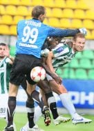 Igor Shuhovtsev returns a ball