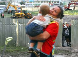 Mother holds a child