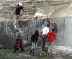 A fight between guards and protesters