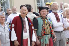 Participants of celebration of Day of the State flag 
