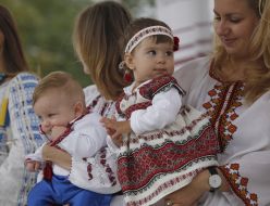 Children in embroidered blouses