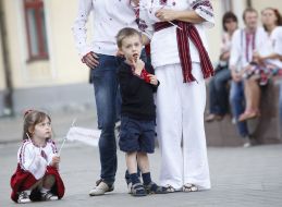 Children in embroidered blouses