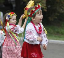 Children in embroidered shirts