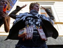 Girl shows self-made humor bomb made from sausages