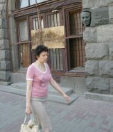 A woman passes near “Syayvo” bookstore 