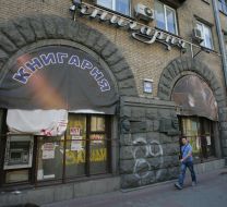 A man passes near “Syayvo” bookstore