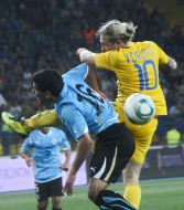 Andrey Voronin and Maximiliano Pereira