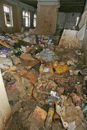 Garbage in the tumbledown apartment of mansion of Murashko