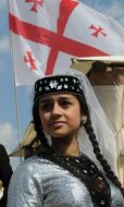 A girl in the national Georgian suit