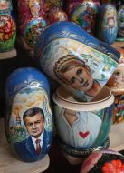 The Russian Dolls with pictures of Viktor Yanukovich and Yuliya Timoshenko