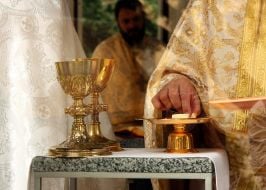 The priest prepares for the church ceremony