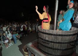 Girls presses a vine by feet