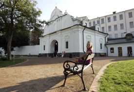 Girl sits on a bench