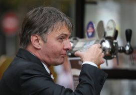 A man drinks beer