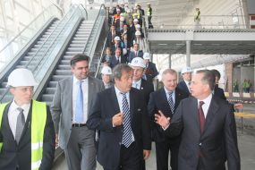 Michel Platinim examines building of passenger air terminal