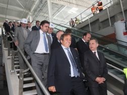 Michel Platinim examines building of passenger air terminal