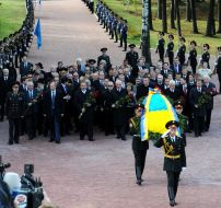 Participants of ceremony of laying-on of flowers