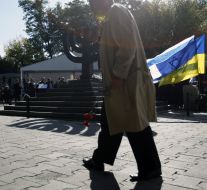 A man goes near the monument