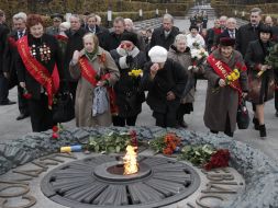 Participants of ceremony of laying-on of flowers