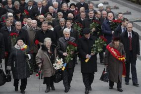 Participants of ceremony of laying-on of flowers