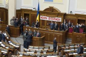 People's deputies from "BYUT-Batkivshchina" block a tribune and presidium of parliament