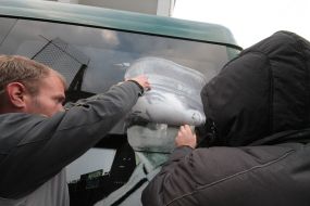 Placing of portrait of Stalin on the rout bus
