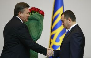 Viktor Yanukovich and Vitaliy Zakharchenko