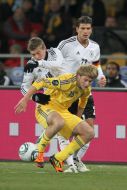 Roman Bezus and Toni Kroos
