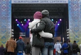 Young people watch a concert