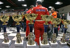 Participants racing of karting standing near the Сups