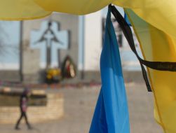 Flags of Ukraine with black ribbons