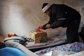 Chernobylets lights a candle