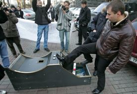 A man breaks up a playing automat