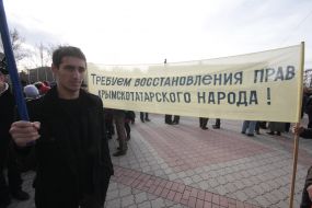 Участник митинга