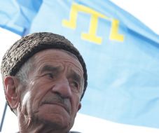 Участник митинга