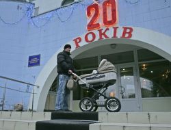 A man with baby buggy